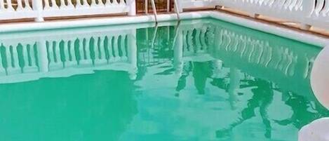 Outdoor pool, open 6:00 AM to 10:00 PM, pool umbrellas, sun loungers