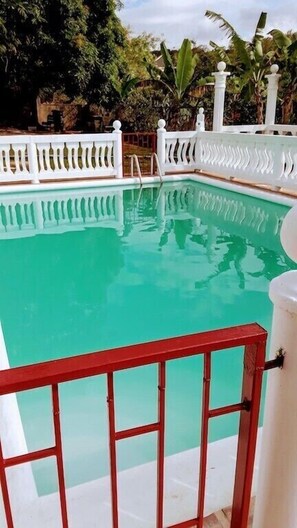 Outdoor pool, open 6:00 AM to 10:00 PM, pool umbrellas, pool loungers - Your Private Get Away on The Hill (Montego Bay)