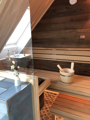Panoramic Suite, Sauna, City View | Bathroom amenities