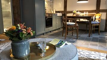 Deluxe Studio Suite, 1 King Bed, City View | Living area | Flat-screen TV