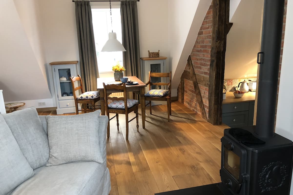 Panoramic Suite, Sauna, City View | Living area | Flat-screen TV