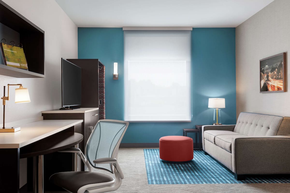 Suite, 1 Bedroom, 1 King with Sofa bed, Non Smoking | 1 bedroom, hypo-allergenic bedding, down comforters, desk