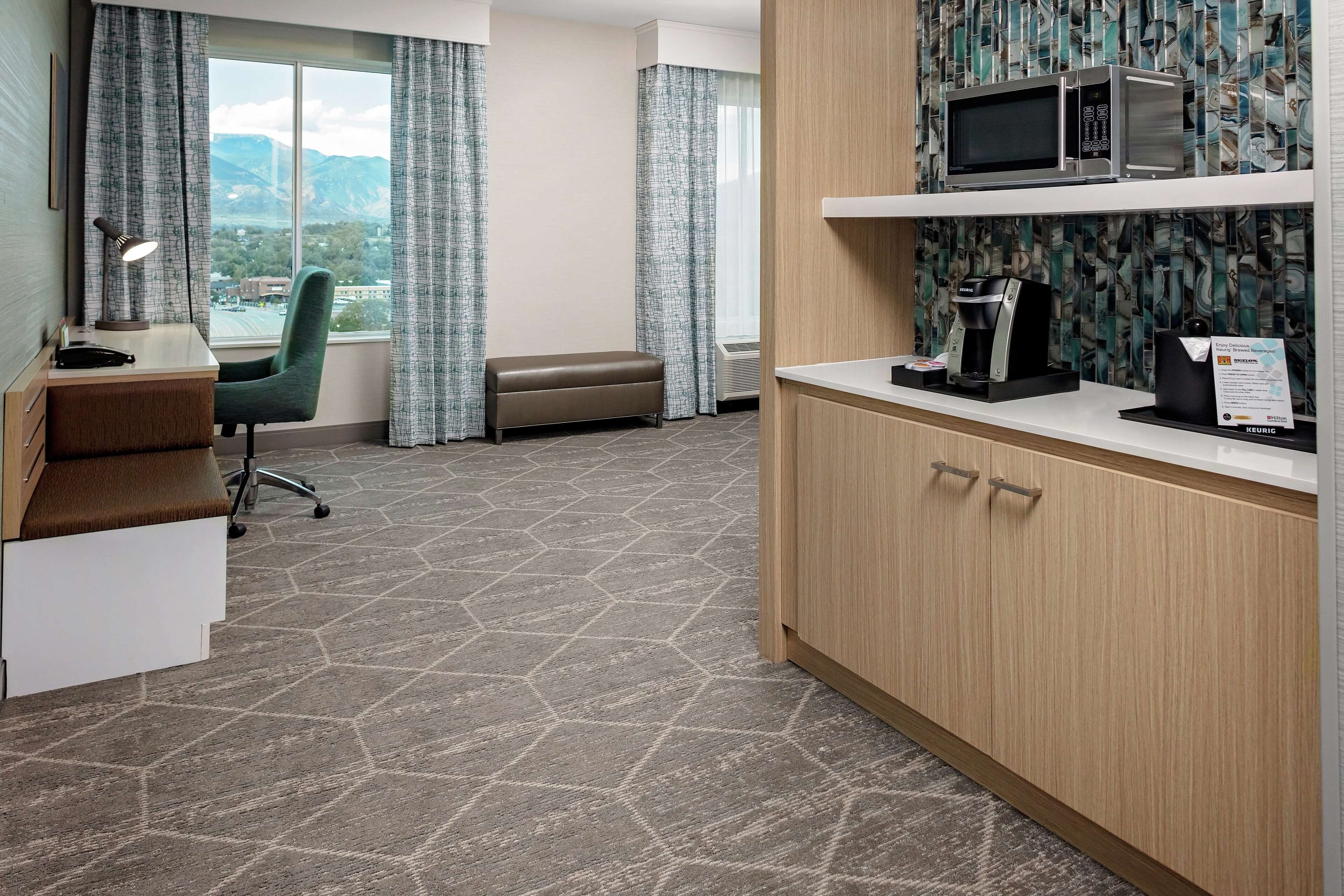 premium bedding, desk, laptop workspace, blackout curtains