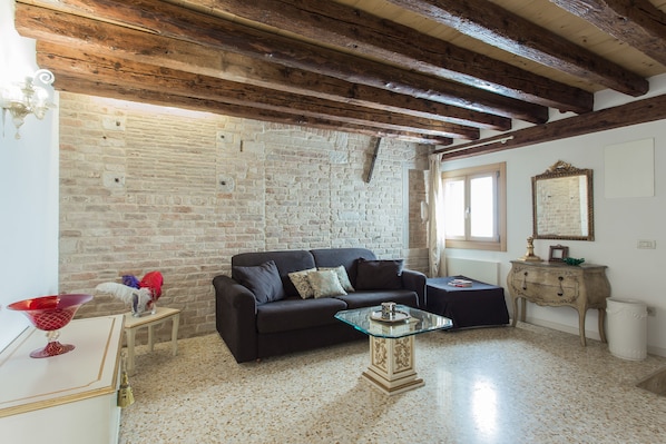 Departamento, 1 habitación | Área de sala de estar