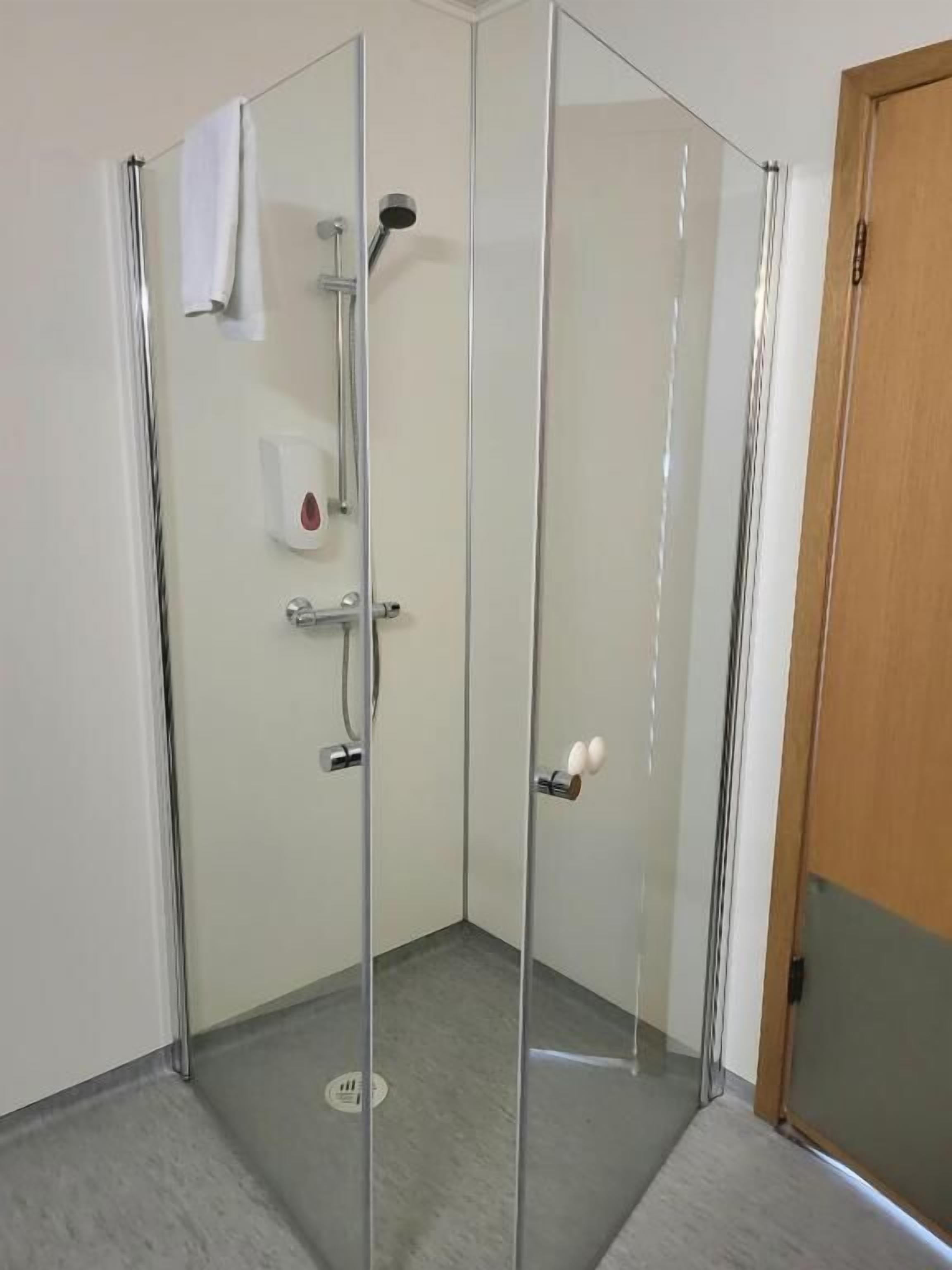 family room | bathroom | shower, free toiletries, hair dryer, bathrobes