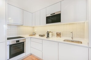 Apartment, 2 Bedrooms | Private kitchen | Full-size fridge, microwave, oven, stovetop - Porto City Elegant Retreat (Porto)
