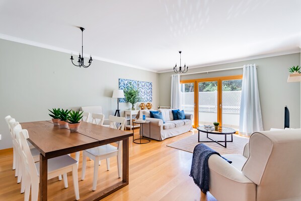 Apartment, 3 Bedrooms | Living area | 32-inch flat-screen TV with cable channels, TV