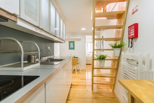 Apartment, 1 Bedroom | Private kitchen | Fridge, microwave, stovetop, highchair