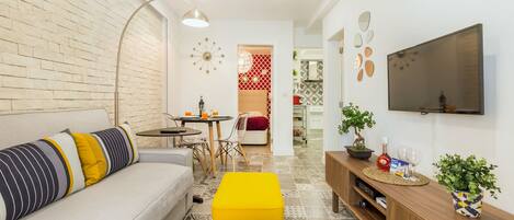 Apartment, 1 Bedroom | Living area | Flat-screen TV