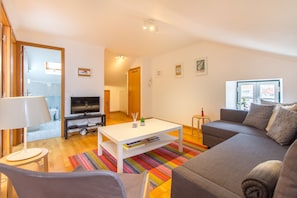 Studio, City View | Living room | Flat-screen TV - Casa Mouraria I Castle Views (Lisbon)