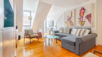 Apartment, 2 Bedrooms | Living room | Flat-screen TV