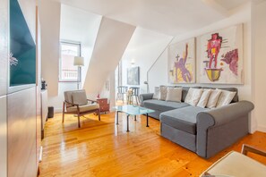 Apartment, 2 Bedrooms | Living room | Flat-screen TV