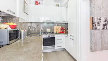 Apartment, 2 Bedrooms | Private kitchen | Full-size fridge, microwave, oven, stovetop