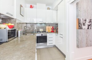 Apartment, 2 Bedrooms | Private kitchen | Full-size fridge, microwave, oven, stovetop