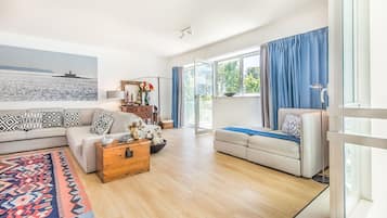 Apartment, 2 Bedrooms | Living area | Flat-screen TV