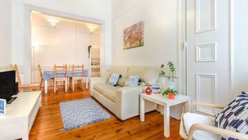 Apartamento, 3 quartos | Área de estar