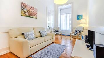 Apartamento, 3 quartos | Área de estar