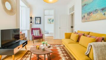 Apartment, 3 Bedrooms | Living room | Flat-screen TV