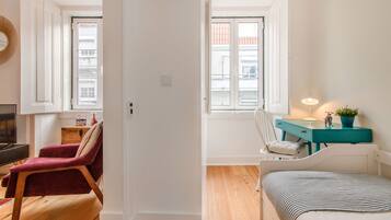 Apartment, 3 Bedrooms | Living area | Flat-screen TV