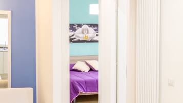 Apartment, 2 Bedrooms | 2 bedrooms, desk, iron/ironing board, travel crib