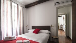 Apartment, 1 Bedroom | 1 bedroom, in-room safe, desk, iron/ironing board - At Home Heart of Milan - Canonica (Milan)