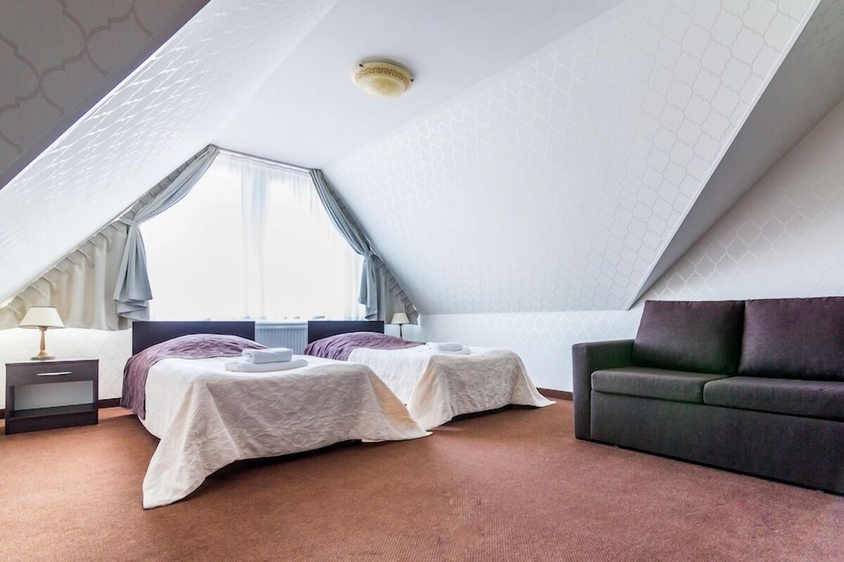 Desk, blackout drapes, rollaway beds (surcharge), WiFi (free)