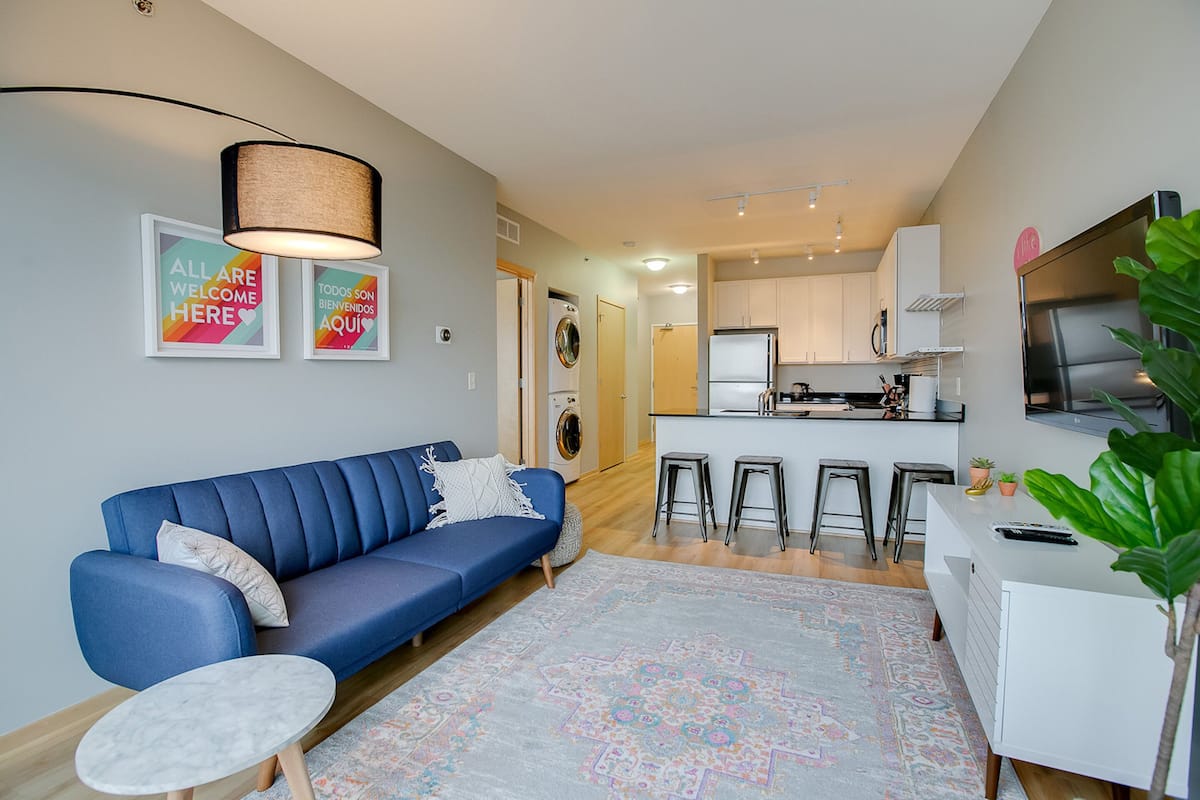 City Apartment, 1 Bedroom | Living room | 45-inch TV with digital channels