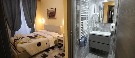 Habitación doble Confort (104) | Camas con efecto memoria y artículos del minibar gratis