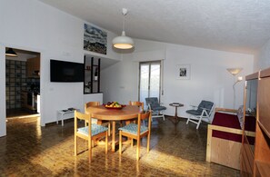 Basic Apartment, 3 Bedrooms | Living area | 48-inch flat-screen TV with digital channels, TV - Maison Giuliana (Santa Croce Camerina)