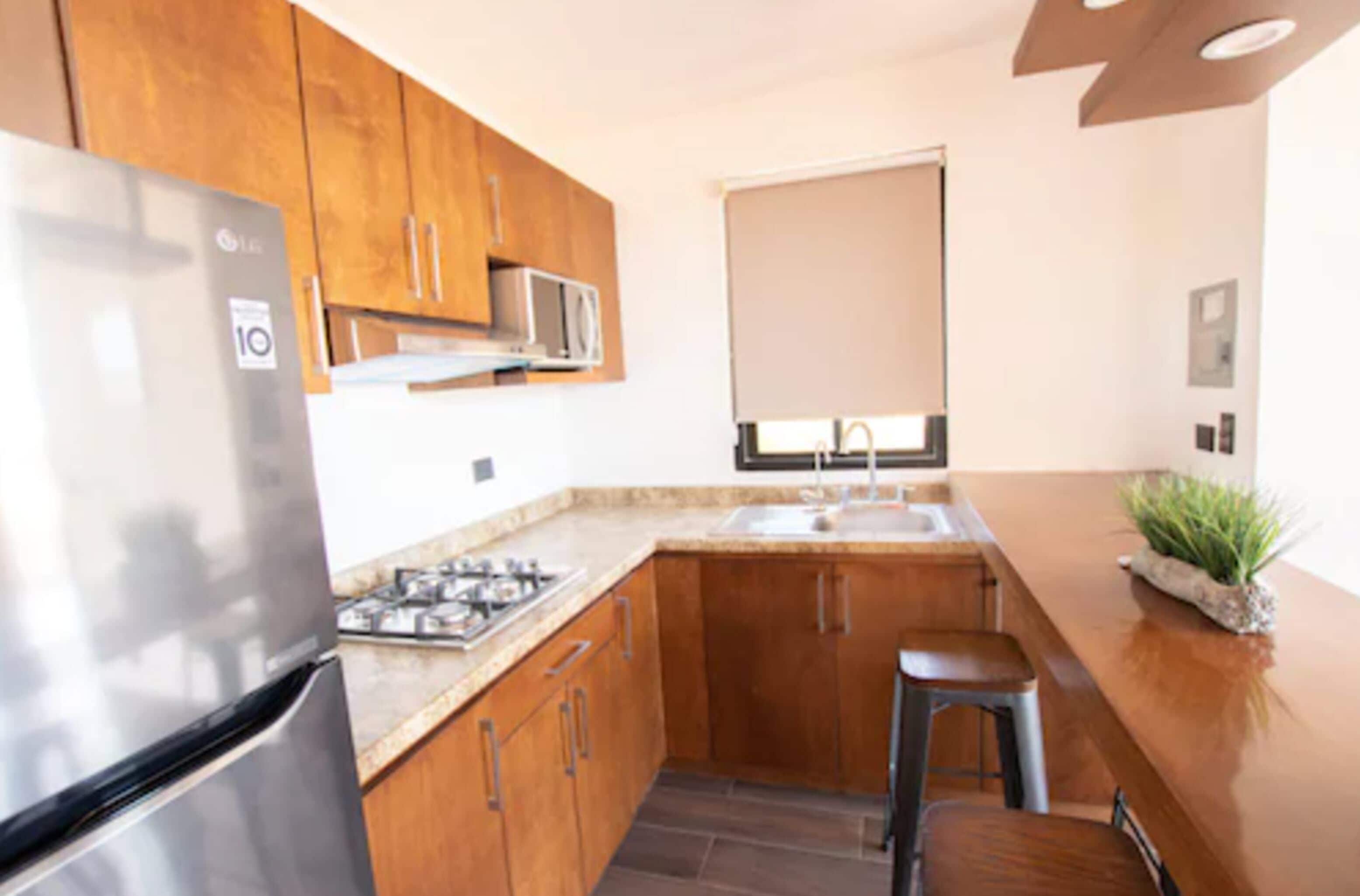 deluxe villa, 2 bedrooms, fireplace, mountain view | private kitchen | mini-fridge, coffee/tea maker, coffee grinder