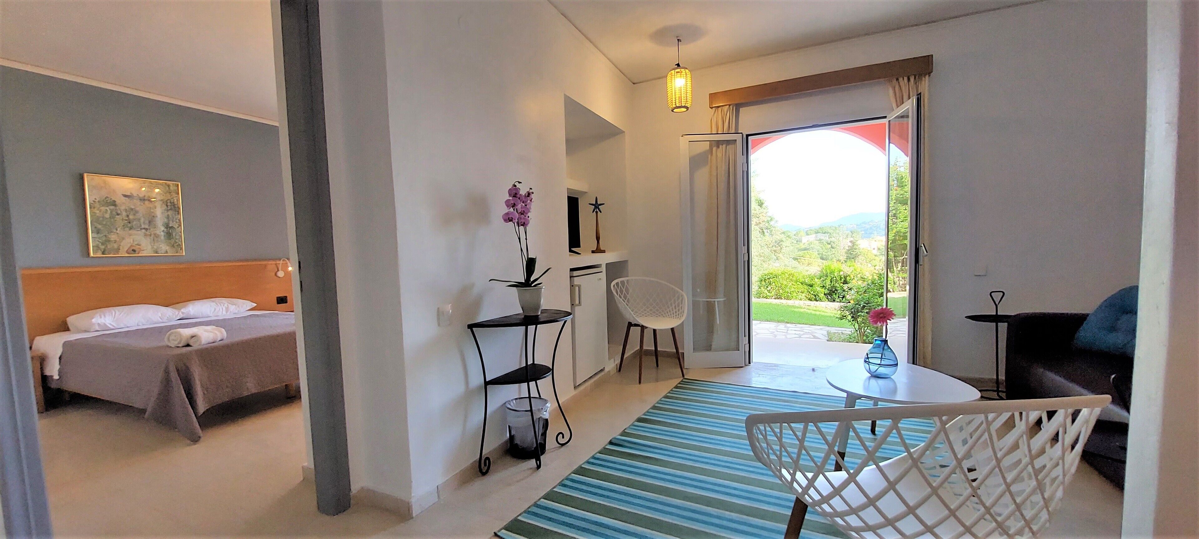 Junior Suite | Living area | 32-inch Smart TV with satellite channels