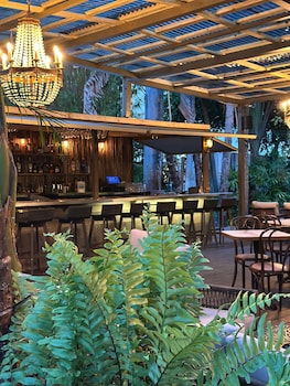 Patio, balcany or terrace at Miami River Inn By Renzzi