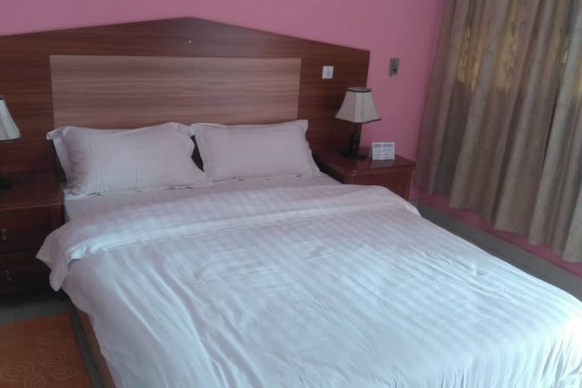 Suite | Premium bedding, Select Comfort beds, desk, blackout curtains