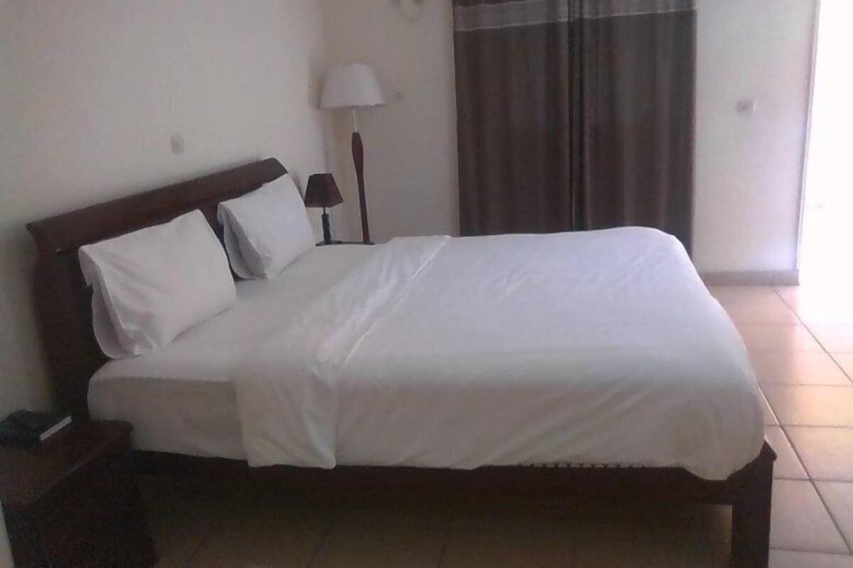 Studio | Premium bedding, Select Comfort beds, desk, blackout curtains