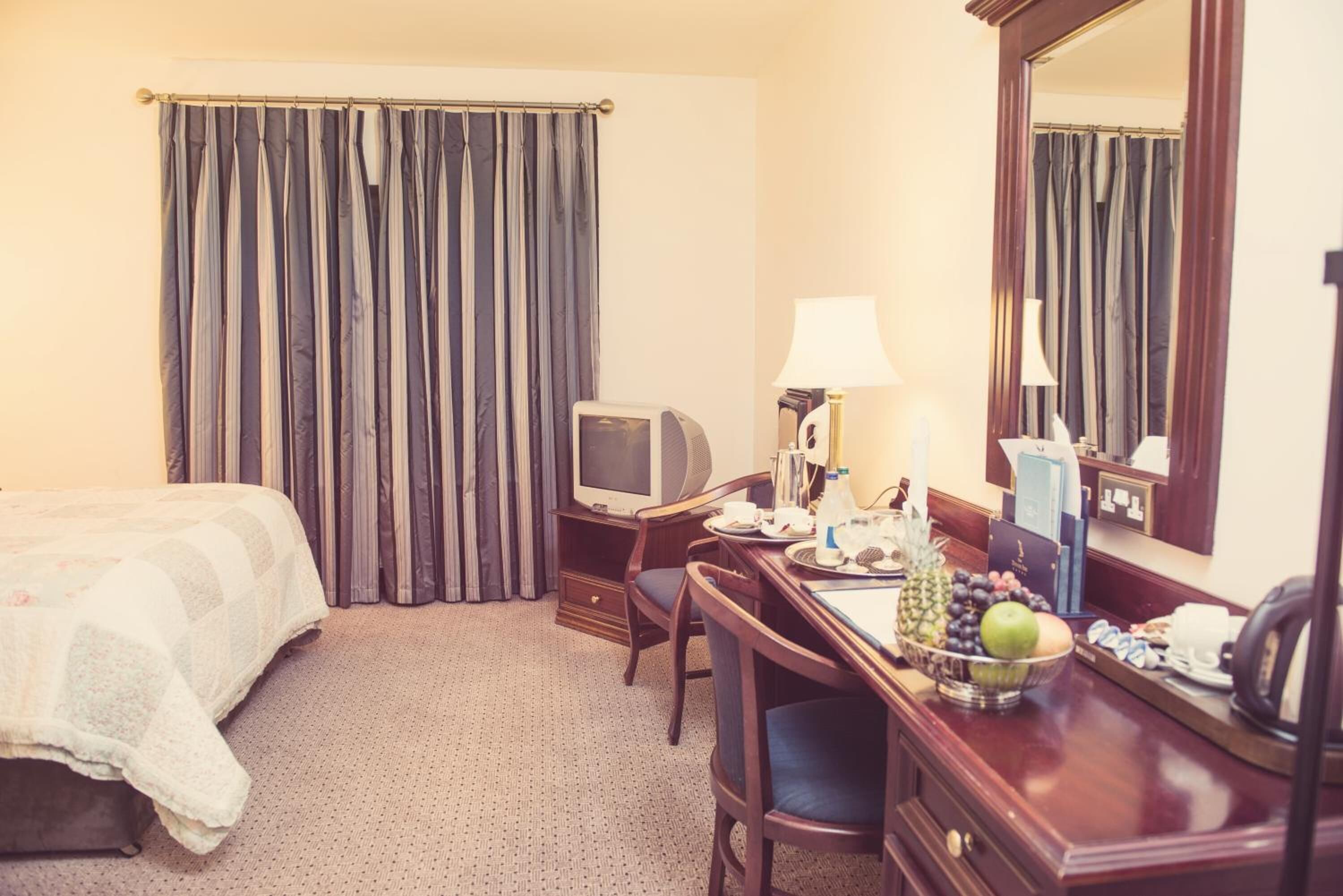 individually decorated, desk, iron/ironing board, free cots/infant beds