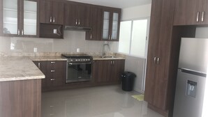Superior Apartment, Multiple Beds, Park View | Private kitchen - Castellum Tangamanga Premium Aparthotel (San Luis Potosi)