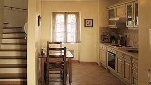 Fridge, dishwasher, dining tables
