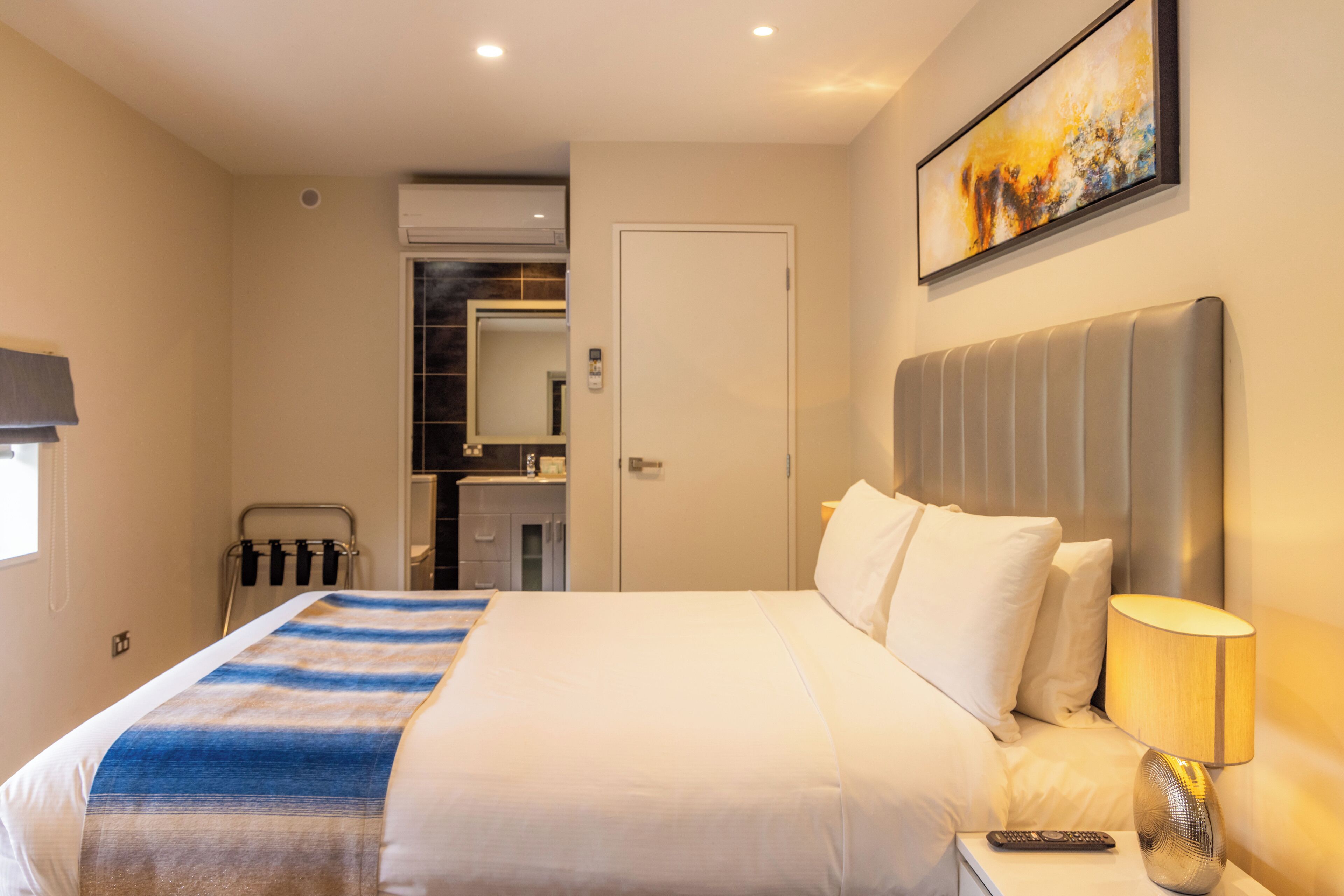 deluxe room, multiple beds, non smoking, kitchen | desk, laptop workspace, free wifi, bed sheets