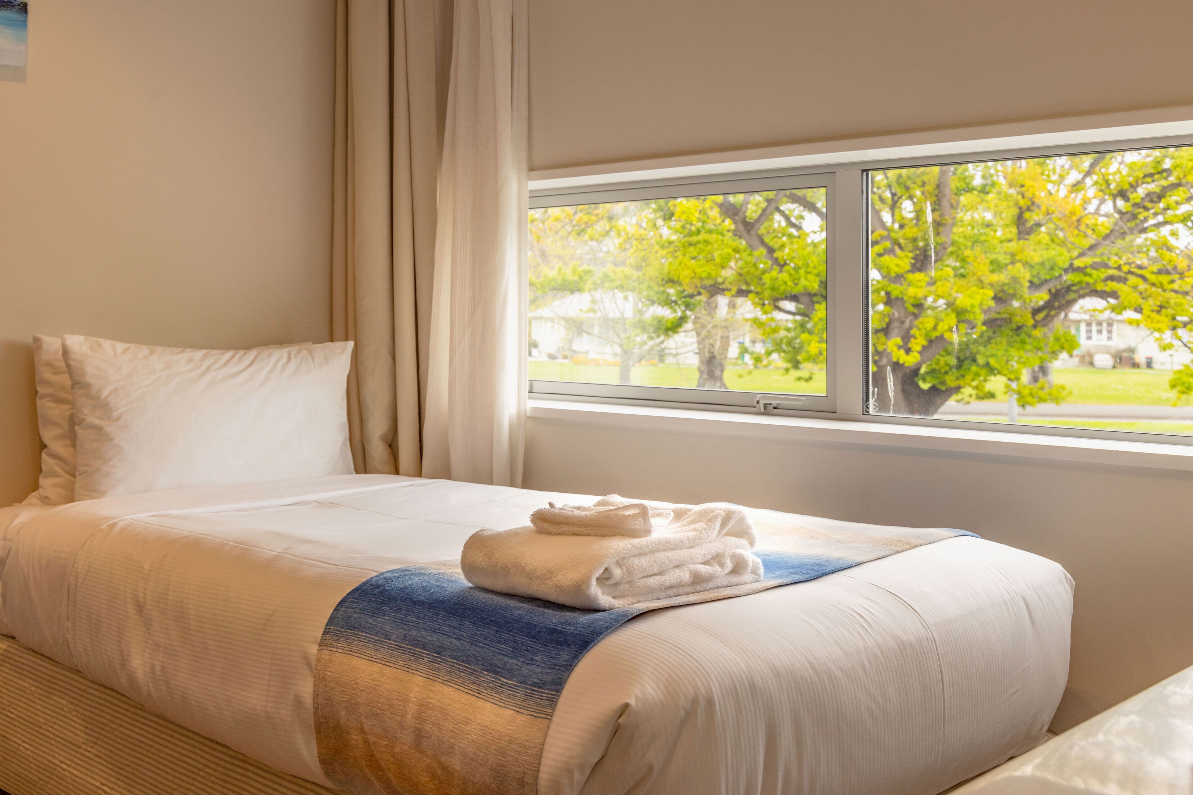 deluxe room, multiple beds, non smoking, kitchen | desk, laptop workspace, free wifi, bed sheets