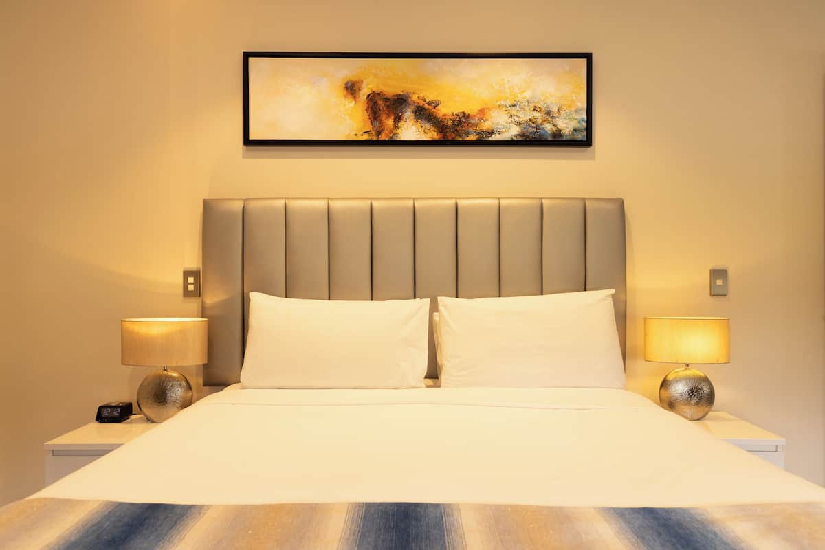 deluxe room, multiple beds, non smoking, kitchen | desk, laptop workspace, free wifi, bed sheets