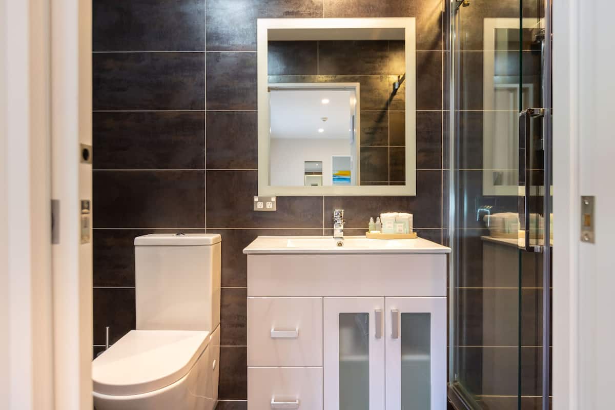 deluxe room, multiple beds, non smoking, kitchen | desk, laptop workspace, free wifi, bed sheets