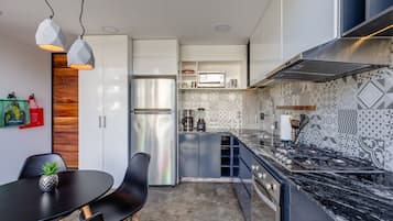 Loft, 1 King Bed with Sofa bed, Non Smoking (Loft 201) | Private kitchen | Microwave, coffee/tea maker