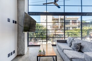 Loft, 1 King Bed with Sofa bed, Non Smoking (Loft 201) | Living area | Smart TV