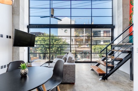 Loft, 1 King Bed with Sofa bed, Non Smoking (Loft 201) | Living area. Lofts on Basilio
