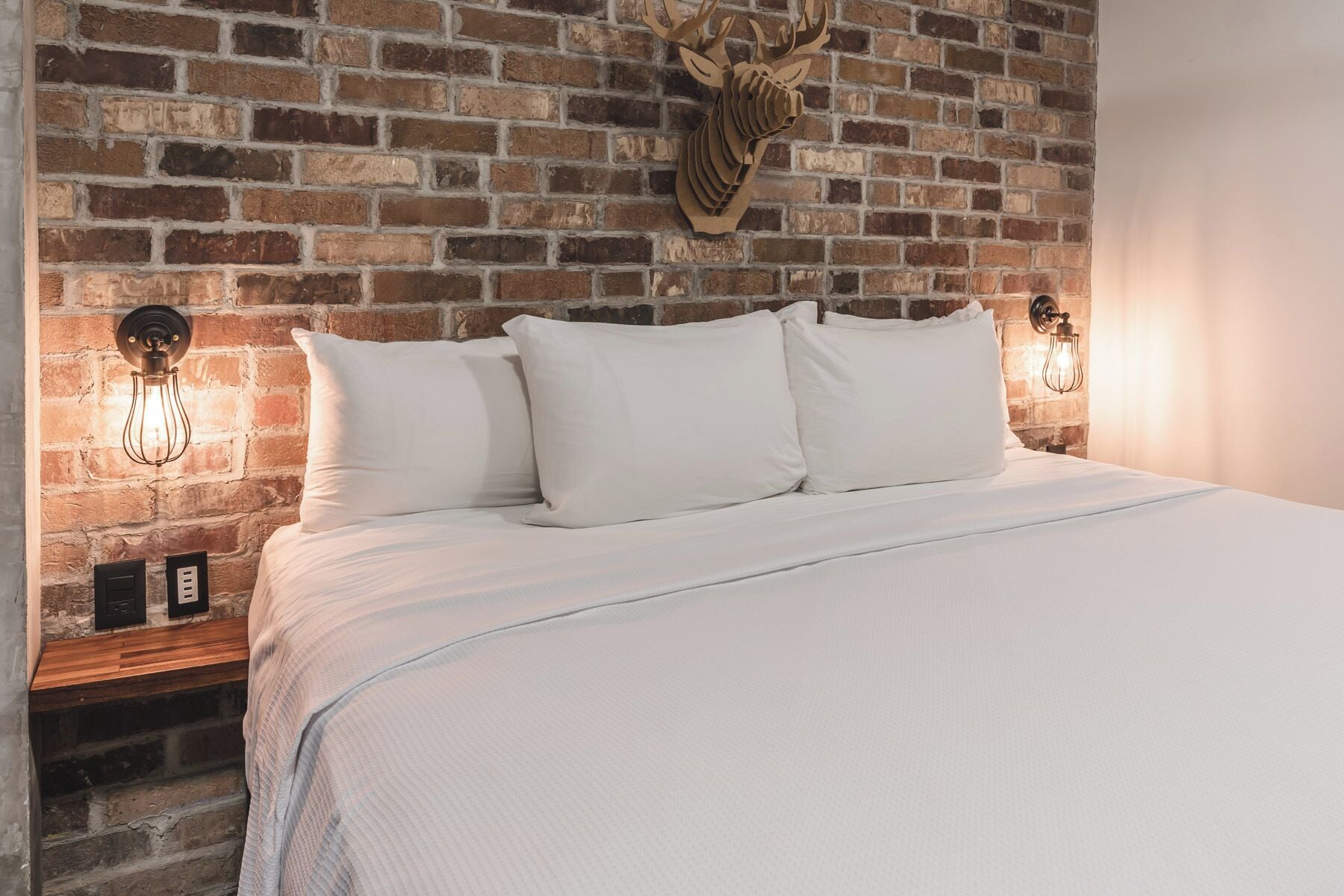 suite 103 : one king bed | premium bedding, memory-foam beds, individually decorated