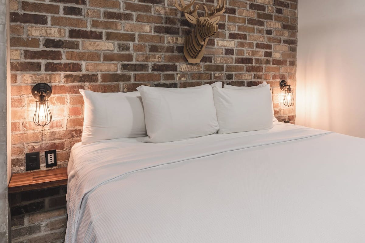 suite 103 : one king bed | premium bedding, memory-foam beds, individually decorated