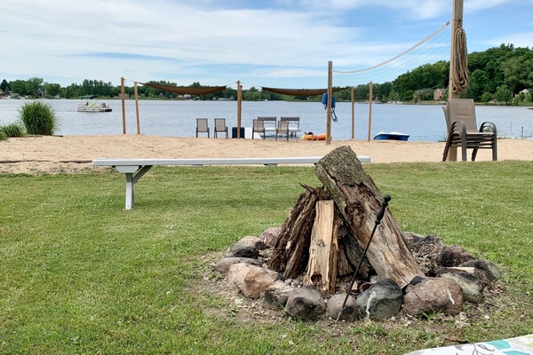 Private fire pit, beach, dock, and volleyball court.