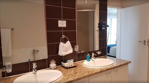 Hair dryer, towels, soap, shampoo