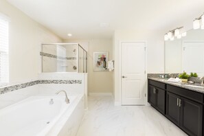 Bathtub, hair dryer, towels