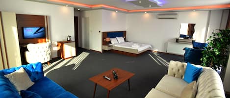 디럭스룸 | 미니바, 객실 내 금고, 무료 WiFi, 침대 시트